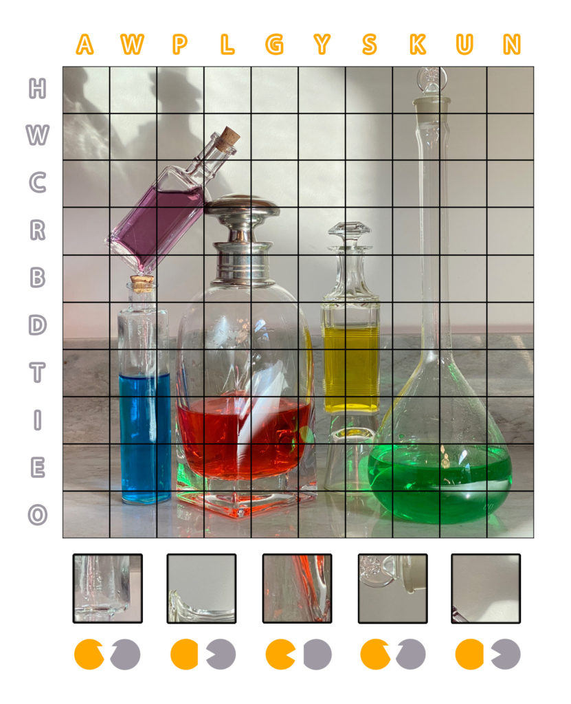 Flasks and beakers of colored fluid